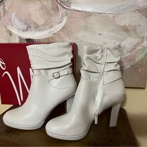 White healed boots
